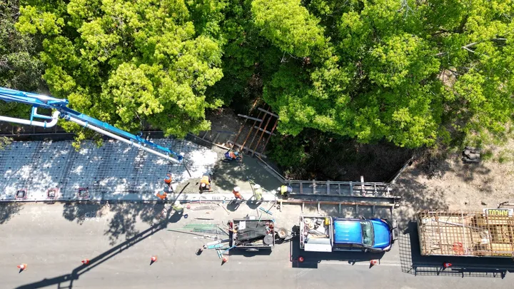 Aerial view of concrete pouring and roadworks as part of Durack Civil's Resilience and Recovery project for Gympie Regional Council under the Disaster Recovery Funding Arrangements
