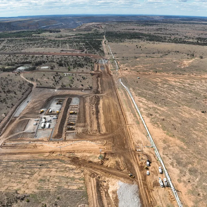 Aerial perspective of road formation and site preparation for mining infrastructure